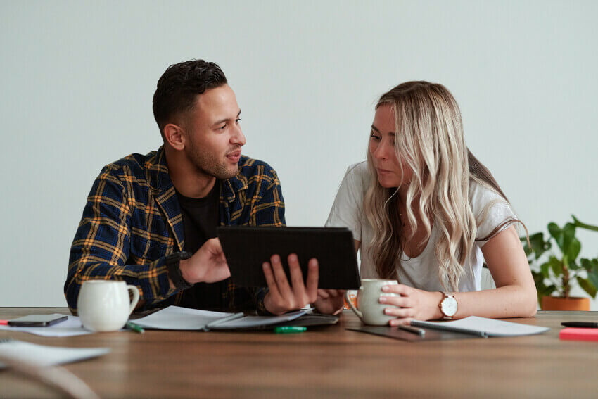 A couple looking at finances together.